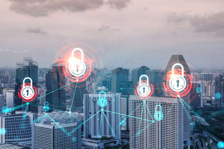 Hologram of Padlock on sunset panoramic cityscape of Singapore, Asia. The concept of cyber security...
