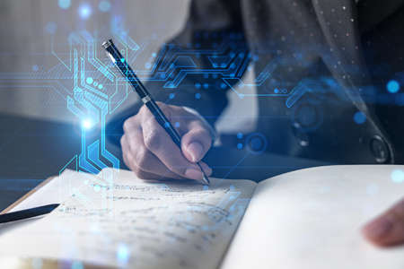 Technology HUD hologram and a woman taking notes. Multiexposure.