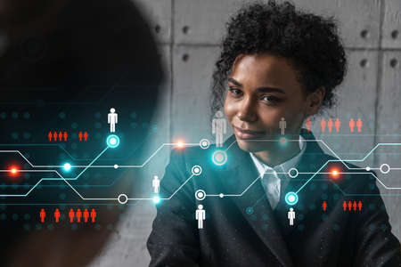Two businesswomen work together in modern office on new project. Double exposure. Concept of...