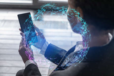 Businesswoman using phone, work in modern office on new project. Double exposure. Concept of success. World map planet earth hologram.の写真素材