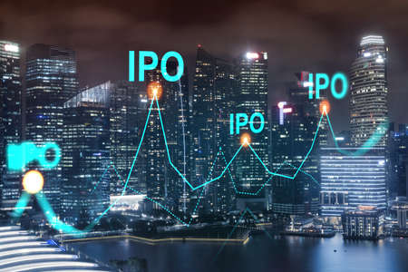 Initial public offering hologram, night panoramic city view of Singapore. The financial center for...