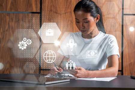 Woman takes notes with phone. Business education concept hologram. Multiexposure.