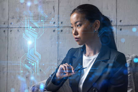Asian businesswoman dream of success. Trchnology drawing hologram. Double exposure.