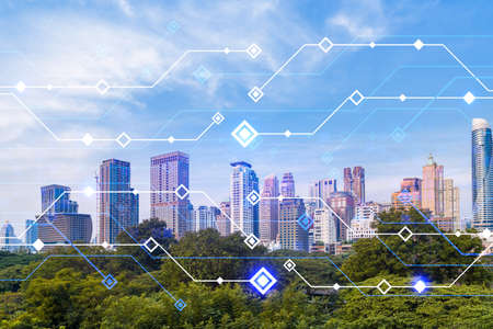Technology hologram over panorama city view of Bangkok. The largest tech hub in Asia. The concept of...