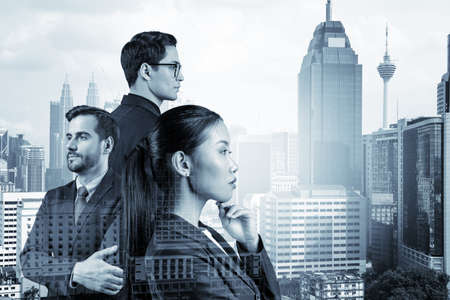Group of three business colleagues in suits dreaming about new career opportunities after MBA...