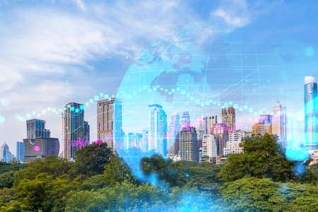 Forex and stock market chart hologram over panorama city view of Bangkok, the financial center in Asia. The concept of international trading. Double exposure.の写真素材