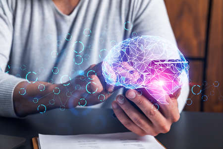 Man using phone. Hands typing smartphone. Double exposure with brain hologram. Close up. Data search...