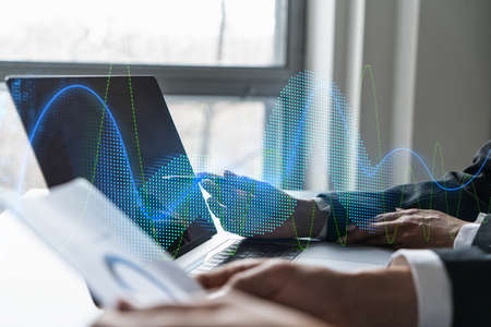Two business people working together on corporate strategy. Try to analyze statistics. Financial...