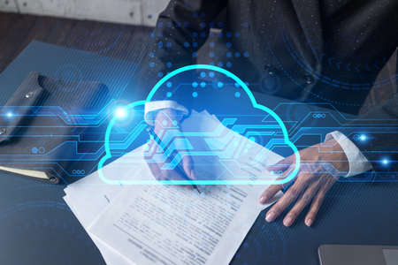 Woman signs agreement. Cloud it hologram. Double exposure . Data storage concept.