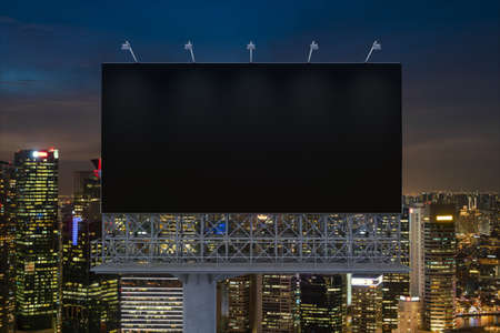 Blank black road billboard with Singapore cityscape background at night time. Street advertising...