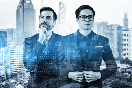 Two handsome businessman in suits thinking about career opportunities at research and development...