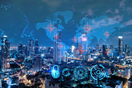 Hologram of Earth planet map on night panoramic cityscape of Bangkok, Asia. The concept of...