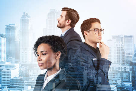 Group of three business partners in suits dreaming and looking for new opportunities to succeed....