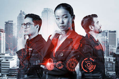 Group of business colleagues as a part of multinational corporate team working on project to protect...