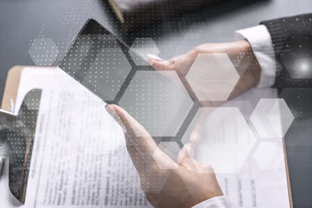 Businesswoman using smart phone in office. Abstract drawing hologram. Double exposure.