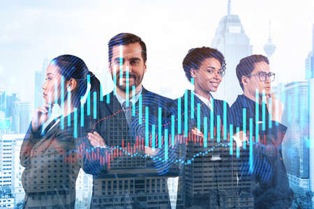 Group of business colleagues in suits as a part of multinational corporate team working on forecasting trading corporate strategy at fund. Forex chart. Kuala Lumpur on background. Double exposureの写真素材