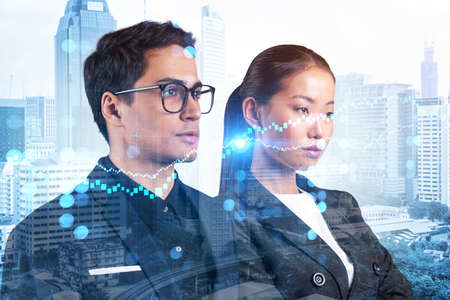 Two colleagues in multinational corporate team dreaming about career opportunities after MBA graduation. Trading at corporate finance fund. Forex chart. Kuala Lumpur. Double exposure.の写真素材