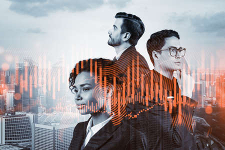 Group of business colleagues working on new venture capital and hi-tech start up and try to forecast risks and estimate prospective earning growth. Hologram chart on Singapore background.の写真素材