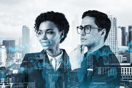 Two colleagues in multinational corporate team dreaming about career opportunities after MBA graduation. Trading at corporate finance fund. Forex chart. Kuala Lumpur. Double exposure.の写真素材