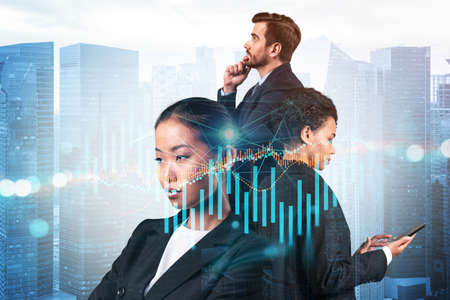 Group of business colleagues working on new venture capital and hi-tech start up and try to forecast...