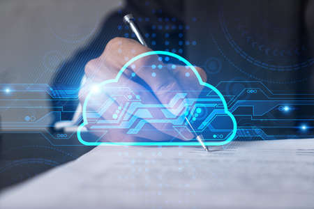 Businessman in suit signs contract. Double exposure with cloud icon hologram. Partnership in it...
