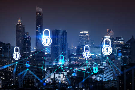 Glowing Padlock hologram, night panoramic city view of Bangkok, Asia. The concept of cyber security...