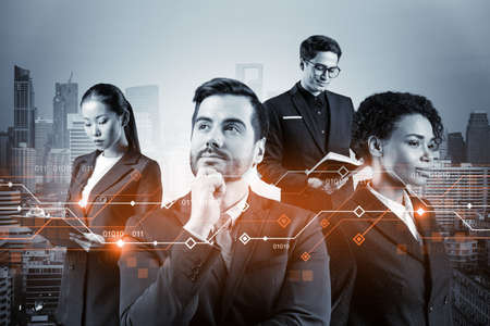 Group of business colleagues working on technology at business process to achieve tremendous growth in commerce. Worldwide process to conduct transactions.の写真素材