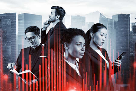 Group of business colleagues working on new venture capital and hi-tech start up and try to forecast risks and estimate prospective earning growth. Hologram chart on Singapore background.の写真素材