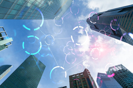 Abstract technology icons hologram on low, wide angle view of glass and steel contemporary...