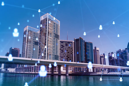 Skyscrapers of Dubai business downtown. International hub of trading and financial services. Social...