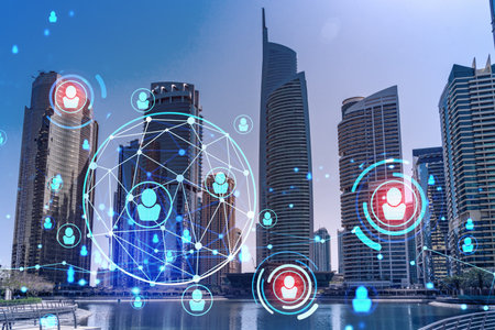 Skyscrapers of Dubai business downtown. International hub of trading and financial services. Social...