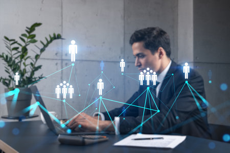 Businessman in office working with laptop, develop networking chain to push new social media project, typing computer. Double exposure.の写真素材
