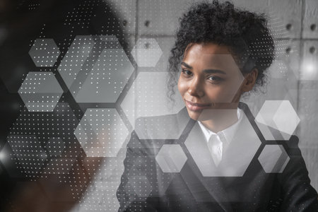Two businesswomen work together in modern office on new project. Double exposure. Concept of...