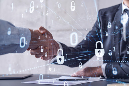 Handshake of two businessmen who enters into the contract to protect cyber security of international company. Padlock Hologram icons over the table with documents.の写真素材