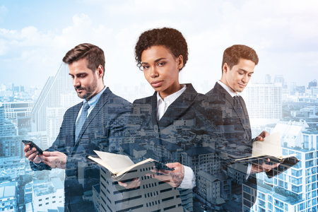 Group of three business colleagues in suits working on project together to gain new career opportunities. Concept of multinational corporate team in Bangkok. Double exposure.の写真素材