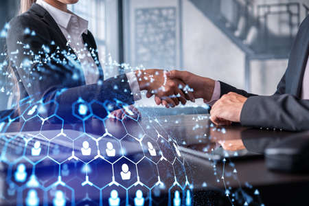 Recruitment concept of hiring of a new talented specialists for international company. Handshake as...