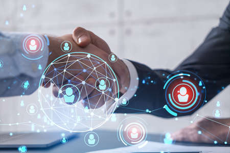 Recruitment concept to hiring of a new talented specialists for international company. Handshake to...