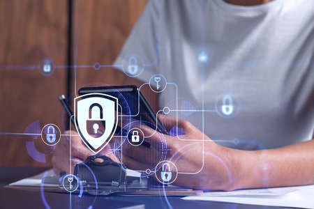 A businesswoman in casual wear signing the contract to prevent probability of risks in cyber...
