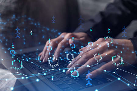 Woman typing the keyboard to create innovative software to change the world and provide a completely...