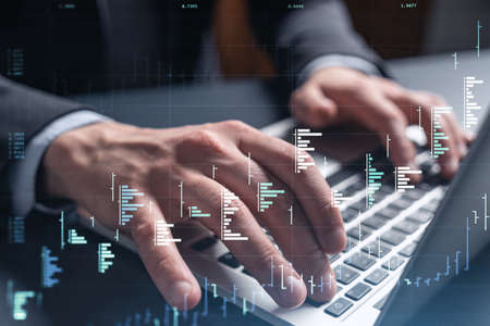 Hands typing the keyboard to research stock market to proceed right investment solutions. Internet trading and wealth management concept. Formal wear. Hologram Forex chart over close up shot.の写真素材