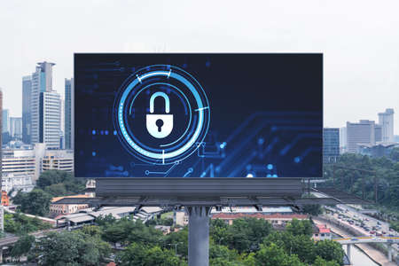 Padlock icon hologram on road billboard over panorama city view of Kuala Lumpur at day time to...