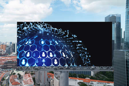Glowing Social media icons on road billboard over panoramic city view of Singapore, Southeast Asia....