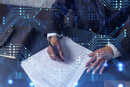 African American businesswoman is signing a contract to create a new software to present it in start...