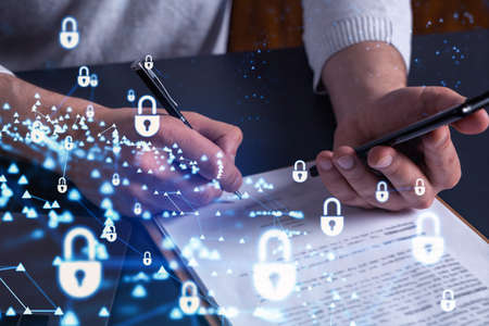 A businessman in casual wear signing the contract to prevent probability of risks in cyber security....