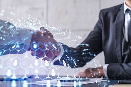 Recruitment concept to hiring of a new talented specialists for international company. Handshake to...
