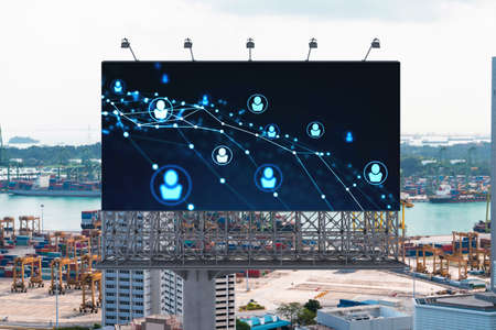 Glowing Social media icons on road billboard over panoramic city view of Singapore, Southeast Asia....