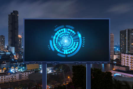 Information flow hologram on road billboard, night panorama city view of Bangkok. The largest...