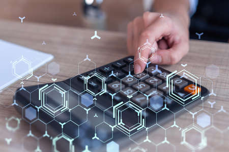 A research and development specialist computing the data to create a new approach to develop high...