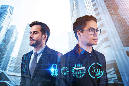 Two handsome businessman in suits thinking about career opportunities at cybersecurity compliance...