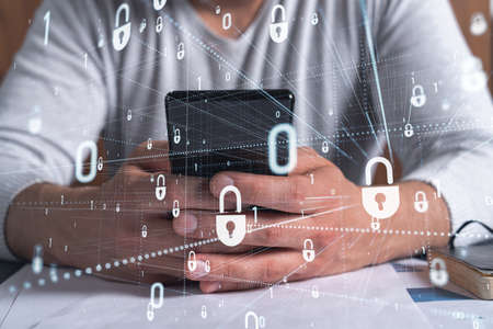 A programmer is browsing the Internet in smart phone to protect a cyber security from hacker attacks...